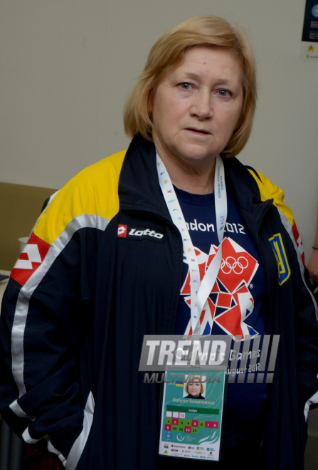 Делегации различных стран проходят аккредитацию на Кубок мира по прыжкам на батуте в Баку. Азербайджан, 3 март, 2016 